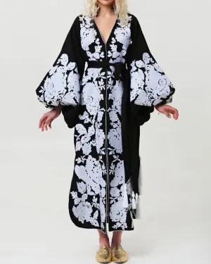 Black dress with white embroidery