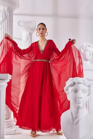 Long Kaftan Designed In A Royal Georgette Fabric Features A Plunging Neckline With Beautiful Intricate Hand Embroidery Along With An Embroidered Belt.