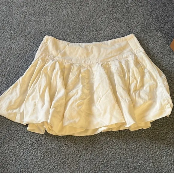 NWT FREE PEOPLE Pillowy Pleated Mini Skirt Light Yellow/ Cream