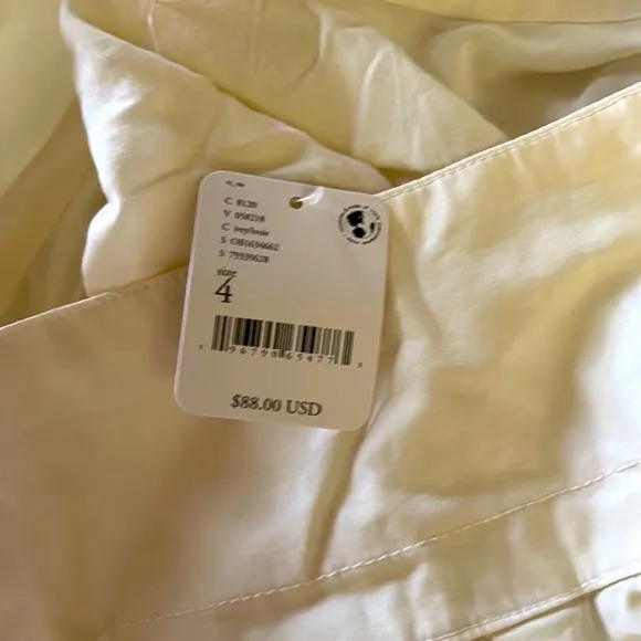 NWT FREE PEOPLE Pillowy Pleated Mini Skirt Light Yellow/ Cream