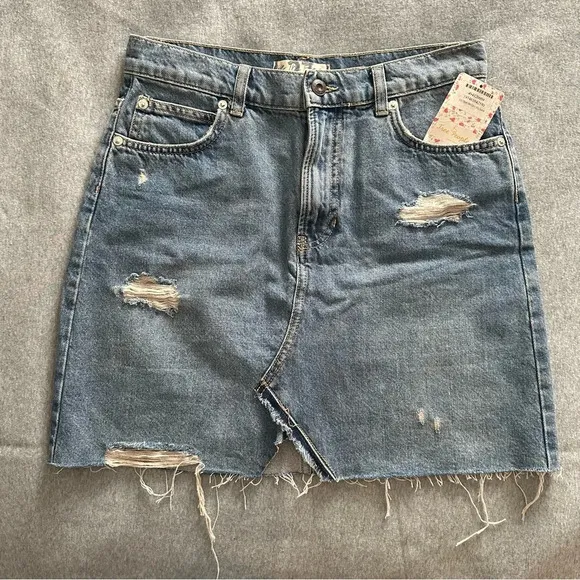 NWT We the Free denim mini skirt distressed raw hem midstone size 27