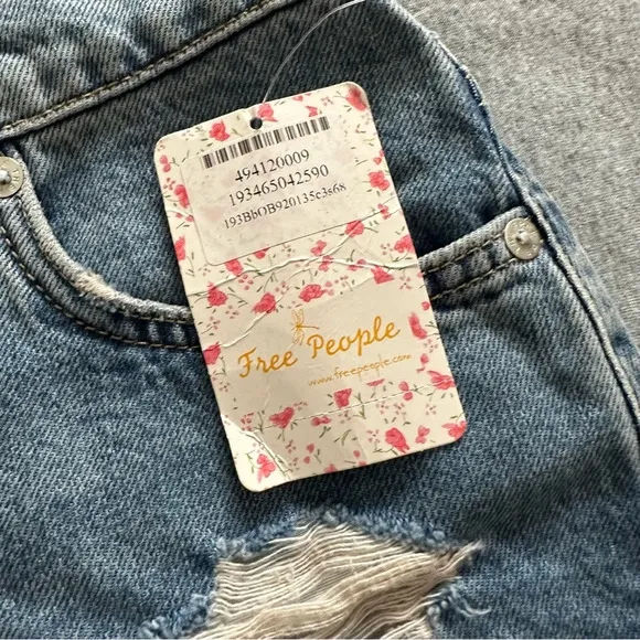 NWT We the Free denim mini skirt distressed raw hem midstone size 27