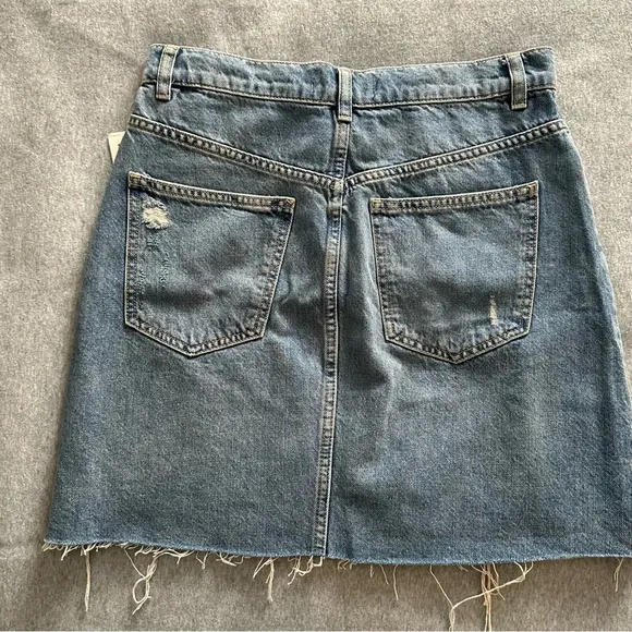 NWT We the Free denim mini skirt distressed raw hem midstone size 27