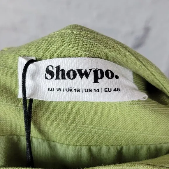 Showpo. Gibson green two piece linen blend crop top knot front midi skirt set