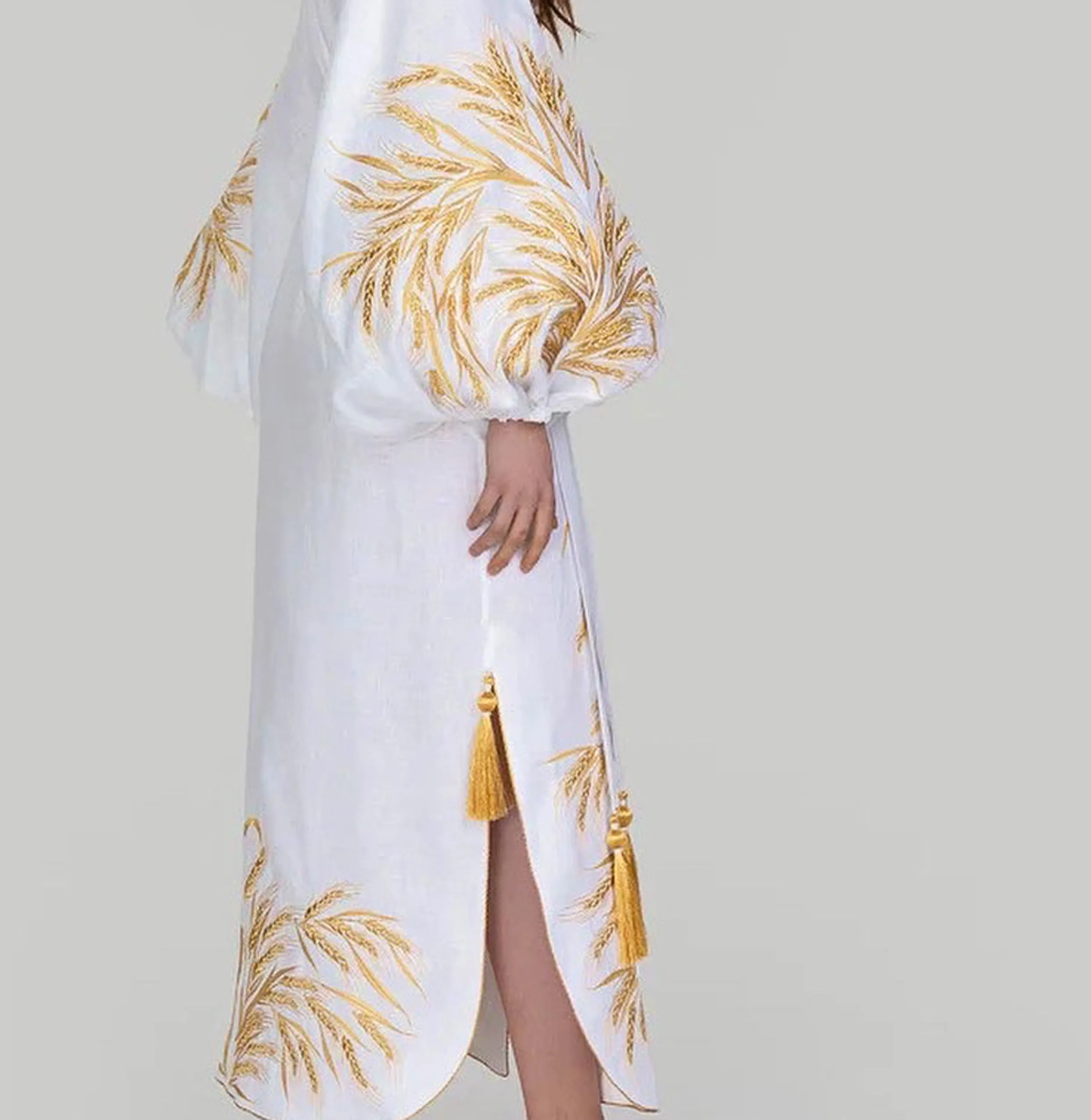 White dress with gold embroidery