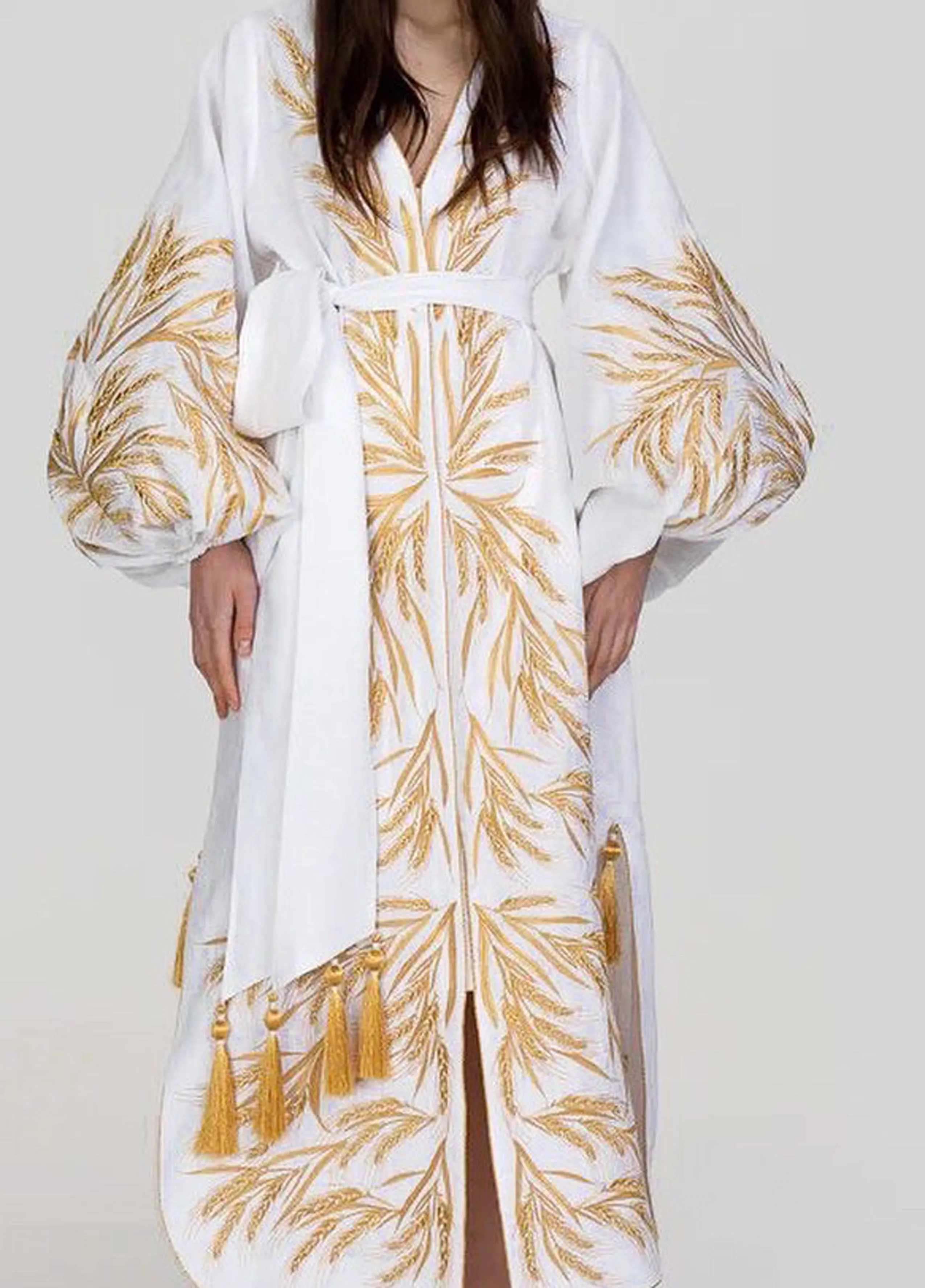 White dress with gold embroidery