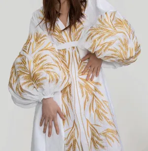 White dress with gold embroidery