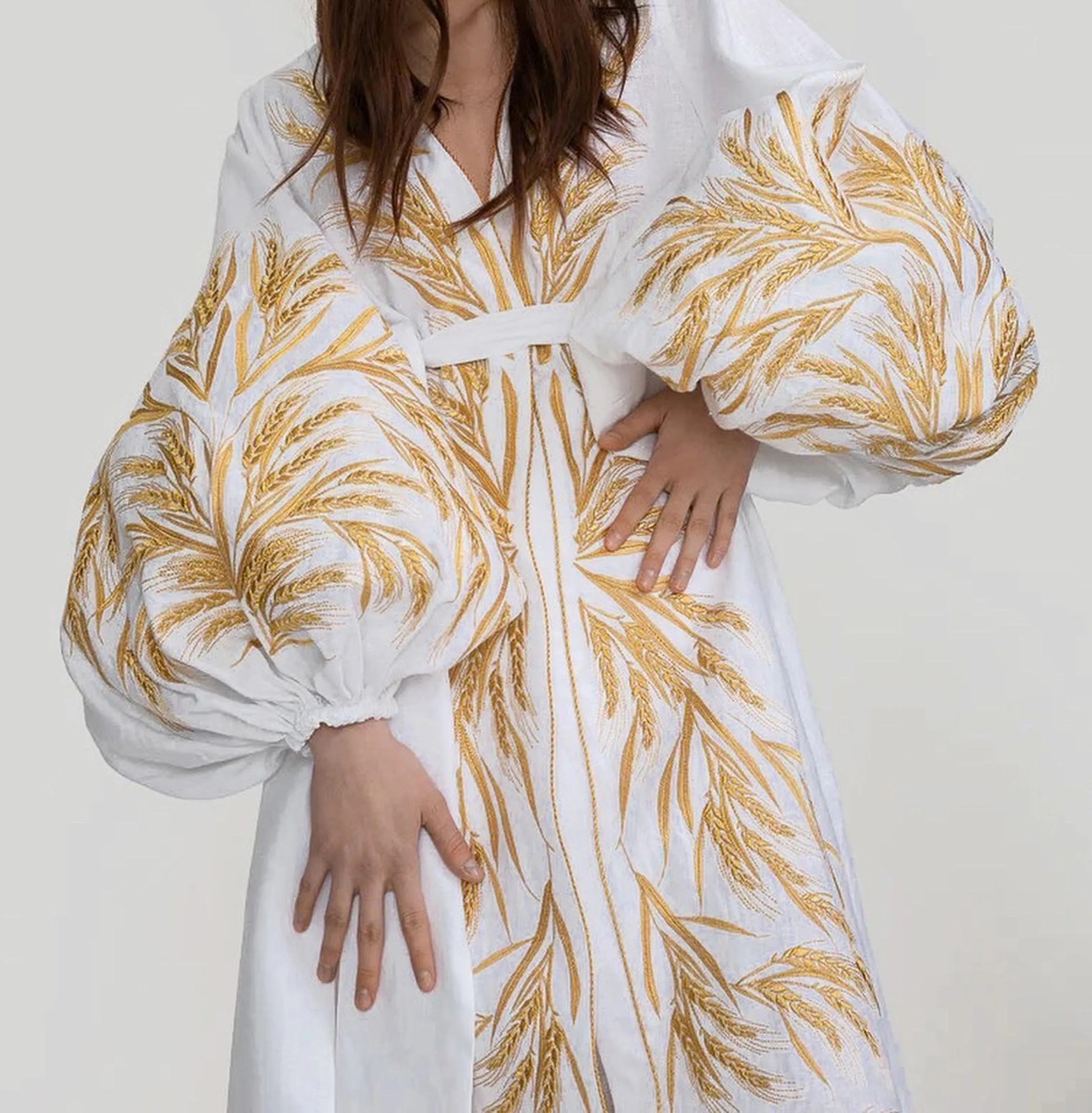 White dress with gold embroidery